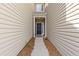Inviting entryway showcasing a covered porch with neutral siding at 2280 Baker Station Dr, Acworth, GA 30101