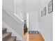 Bright entryway showcasing hardwood floors, a staircase, and natural light at 2280 Baker Station Dr, Acworth, GA 30101