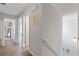 Hallway with neutral walls, carpet flooring, and white doors at 2280 Baker Station Dr, Acworth, GA 30101