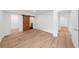 Spacious bedroom with hardwood floors, a barn door, and easy access to other rooms at 2385 Perkerson Sw Rd, Atlanta, GA 30315