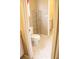 Small bathroom with toilet and shelving, showcasing a functional design at 287 Diamond Ct, Carrollton, GA 30116
