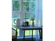 Bright dining area featuring a table setting with charming decor and a view of the lush outdoors at 287 Diamond Ct, Carrollton, GA 30116