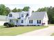 Charming two-story home with a well-manicured lawn and inviting front porch at 287 Diamond Ct, Carrollton, GA 30116