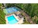 Birds eye view of the community pool, tennis court, and pool house at 2987 Windward Nw Dr, Kennesaw, GA 30152