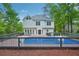 A home with an in-ground pool, expansive deck, fenced yard, and charming backyard space at 2987 Windward Nw Dr, Kennesaw, GA 30152