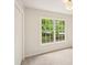Bright bedroom features neutral carpet, fresh paint and large windows looking out to the landscaped yard at 2987 Windward Nw Dr, Kennesaw, GA 30152