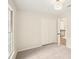 This bedroom is well lit with two windows, soft carpet and a roomy closet for plenty of storage at 2987 Windward Nw Dr, Kennesaw, GA 30152