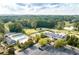 An aerial view shows the community clubhouse, pool, tennis courts, and golf course at 3353 Greenfield Dr, Marietta, GA 30068