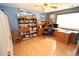 Functional bedroom features desk area, hardwood floor, and great natural light at 3353 Greenfield Dr, Marietta, GA 30068