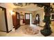Inviting foyer with tile floors, decorative accents, and a view of the front door at 3353 Greenfield Dr, Marietta, GA 30068