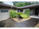 Front entrance featuring a small decorative water feature and a covered entryway at 3353 Greenfield Dr, Marietta, GA 30068