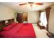 Spacious main bedroom with closet, neutral carpet, and a large window at 3353 Greenfield Dr, Marietta, GA 30068