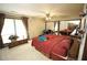 Spacious main bedroom with closet, neutral carpet, and a large window at 3353 Greenfield Dr, Marietta, GA 30068