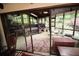 Inviting sunroom featuring walls of windows, skylights, and comfortable seating areas at 3353 Greenfield Dr, Marietta, GA 30068