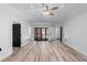 Open bedroom featuring walkout access and large windows for natural light, plus ensuite bathroom at 140 Emily Sw Dr, Lilburn, GA 30047