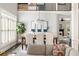 Inviting dining area with elegant décor and plenty of natural light open to the living area at 1887 Chamdun Pl, Brookhaven, GA 30341