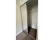 Mirrored closet doors, with a view inside, provide plenty of storage space at 218 Osmanthus Way, Canton, GA 30114