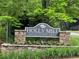 Stone monument sign for Holly Mill Recreation Area with surrounding greenery at 218 Osmanthus Way, Canton, GA 30114