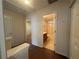 Hallway with access to bedrooms and a full bathroom at 218 Osmanthus Way, Canton, GA 30114