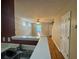 View from kitchen featuring hardwood floors, fireplace and entry to living room at 218 Osmanthus Way, Canton, GA 30114