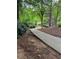Paved walking trail winds through the community, offering a serene outdoor experience at 218 Osmanthus Way, Canton, GA 30114