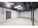 Unfinished basement featuring painted ceilings, support beams, and cement walls at 402 Summit Ridge Ter, Lawrenceville, GA 30046