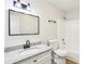 Bathroom with granite countertops, modern fixtures, a toilet, and a shower with great lighting at 402 Summit Ridge Ter, Lawrenceville, GA 30046