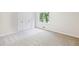 Spacious bedroom with plush carpet and a closet at 402 Summit Ridge Ter, Lawrenceville, GA 30046