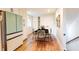 Bright dining area featuring a table set for four and a stylish, modern refrigerator at 3412 Collier Nw Dr, Atlanta, GA 30331