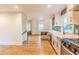 Open-concept kitchen with stainless steel appliances and an eat-in area that flows into the living space at 3412 Collier Nw Dr, Atlanta, GA 30331