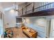 Bright living room with a soaring ceiling, modern decor, and hardwood floors at 3412 Collier Nw Dr, Atlanta, GA 30331