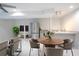 Bright living space boasts a kitchenette and dining area, creating a cozy and functional ambiance at 3412 Collier Nw Dr, Atlanta, GA 30331
