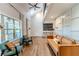 Inviting living room featuring hardwood floors, lots of natural light, and modern accents at 3412 Collier Nw Dr, Atlanta, GA 30331