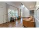 Well-lit living room with high ceilings, hardwood floors, and stylish furniture at 3412 Collier Nw Dr, Atlanta, GA 30331