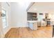 Open-concept living area leading to modern kitchen with stainless steel appliances at 3412 Collier Nw Dr, Atlanta, GA 30331