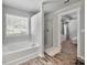 Bright bathroom featuring a soaking tub, standalone shower and neutral color palette at 1452 Weatherbrook Cir, Lawrenceville, GA 30043