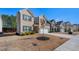 Attractive residence features a two-car garage, green lawn, and traditional design in a suburban setting at 1452 Weatherbrook Cir, Lawrenceville, GA 30043