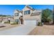 Modern two-story home showcasing a wide driveway, well-maintained lawn, and inviting curb appeal at 1452 Weatherbrook Cir, Lawrenceville, GA 30043
