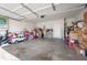 Spacious two car garage filled with boxes and toys at 1452 Weatherbrook Cir, Lawrenceville, GA 30043