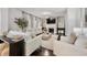 Inviting living room featuring a cozy fireplace, comfortable seating, and stylish decor for relaxation and entertainment at 1452 Weatherbrook Cir, Lawrenceville, GA 30043