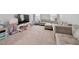 Playroom with neutral carpet, play structures, comfortable seating, and plenty of space for creative play at 1452 Weatherbrook Cir, Lawrenceville, GA 30043