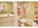 Neutral bathroom with a shower-tub combination, tile floors, and vanity at 2160 Dillard Xing, Tucker, GA 30084