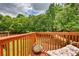Inviting deck space with scenic views of mature trees and lush greenery at 2160 Dillard Xing, Tucker, GA 30084