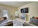 Inviting living room features a decorative fireplace and large television, great for relaxing at 2160 Dillard Xing, Tucker, GA 30084