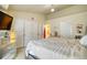 Cozy bedroom featuring a mirrored dresser, walk-in closets, and plenty of natural light at 2160 Dillard Xing, Tucker, GA 30084