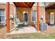 Private back patio with outdoor seating perfect for relaxing or entertaining guests at 2160 Dillard Xing, Tucker, GA 30084
