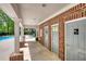 View of pool house, showing restrooms and covered patio area at 2160 Dillard Xing, Tucker, GA 30084