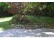 Landscaping with rock wall and a Japanese maple tree at 2381 Eastway Rd, Decatur, GA 30033