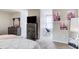 Bright bedroom featuring carpeted floors, neutral colored walls, and natural light at 3099 Regency Park Dr, Lithonia, GA 30038
