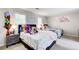 Cozy bedroom featuring neutral walls, two beds, carpeted floor, and natural light at 3099 Regency Park Dr, Lithonia, GA 30038